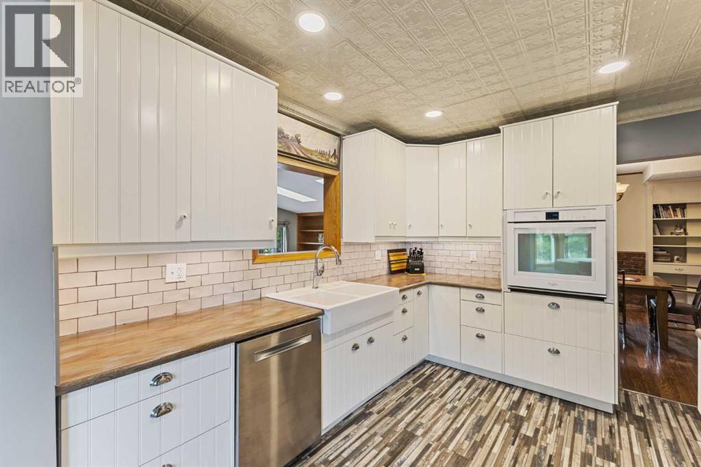Kitchen with opening into the bonus room