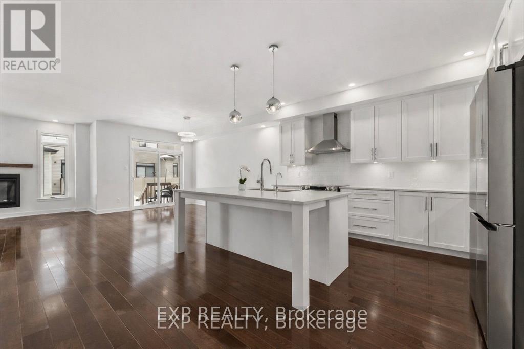 Kitchen with upgraded island and quartz counters