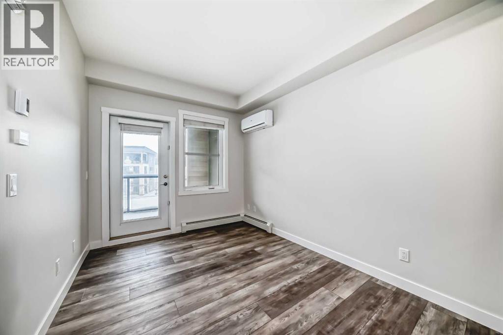 #311 55 Wolf Hollow Crescent SE - 16
