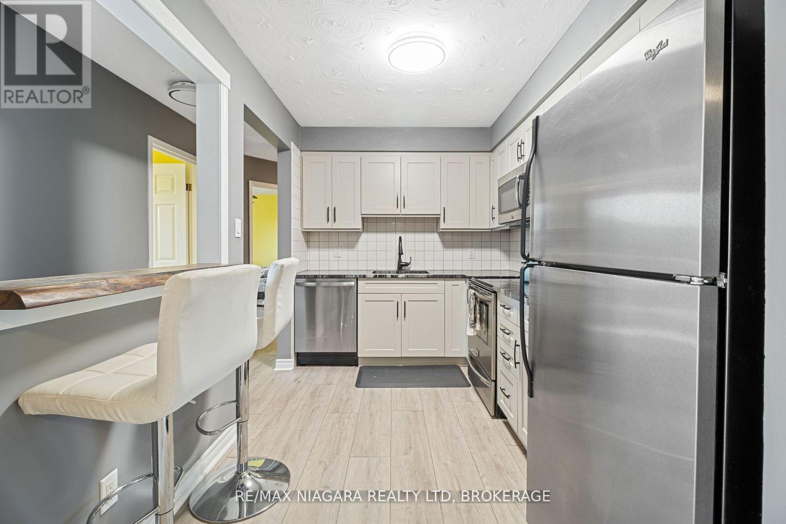 #302 78 WELLAND STREET N - 3