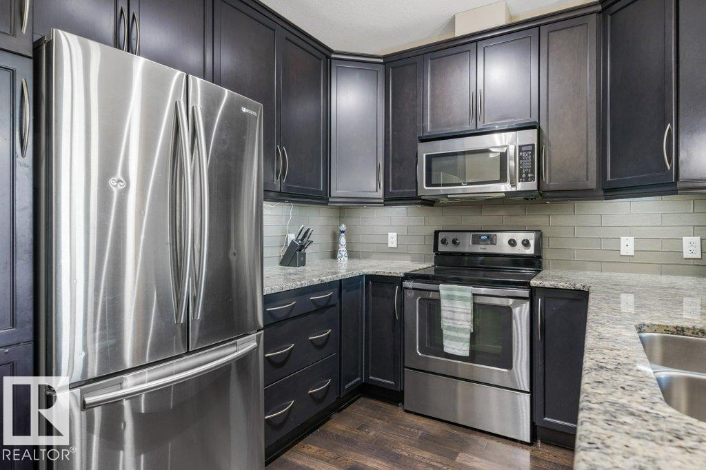 #217 6083 MAYNARD WY NW - 6