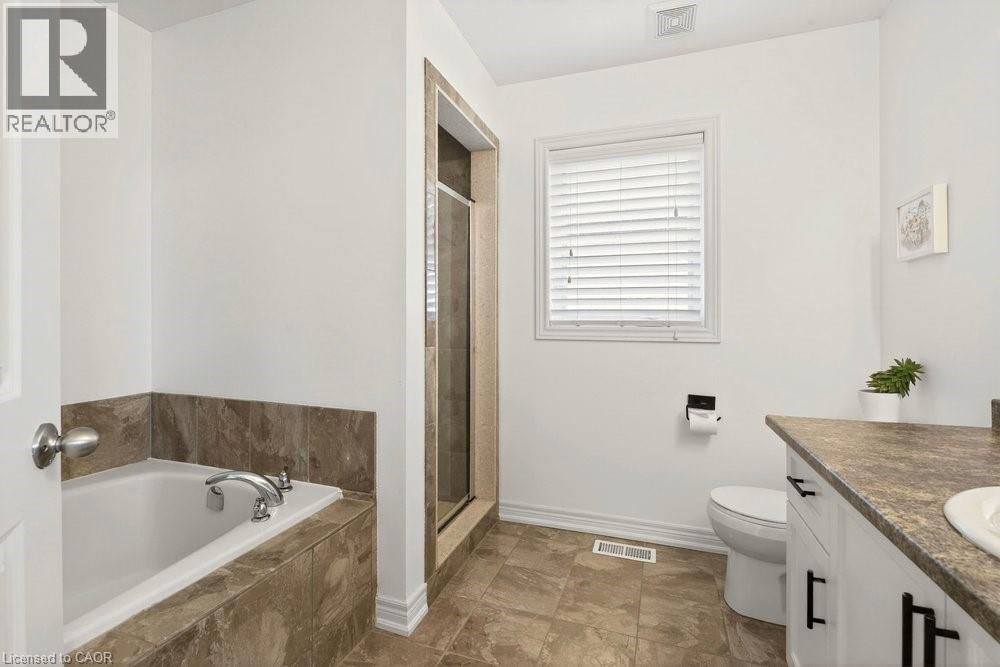 49 NARBONNE Crescent, Stoney Creek, Ontario, L8J0J7 — Photo 2