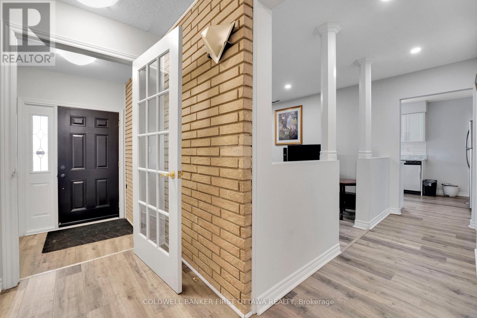 View of front foyer and living room.