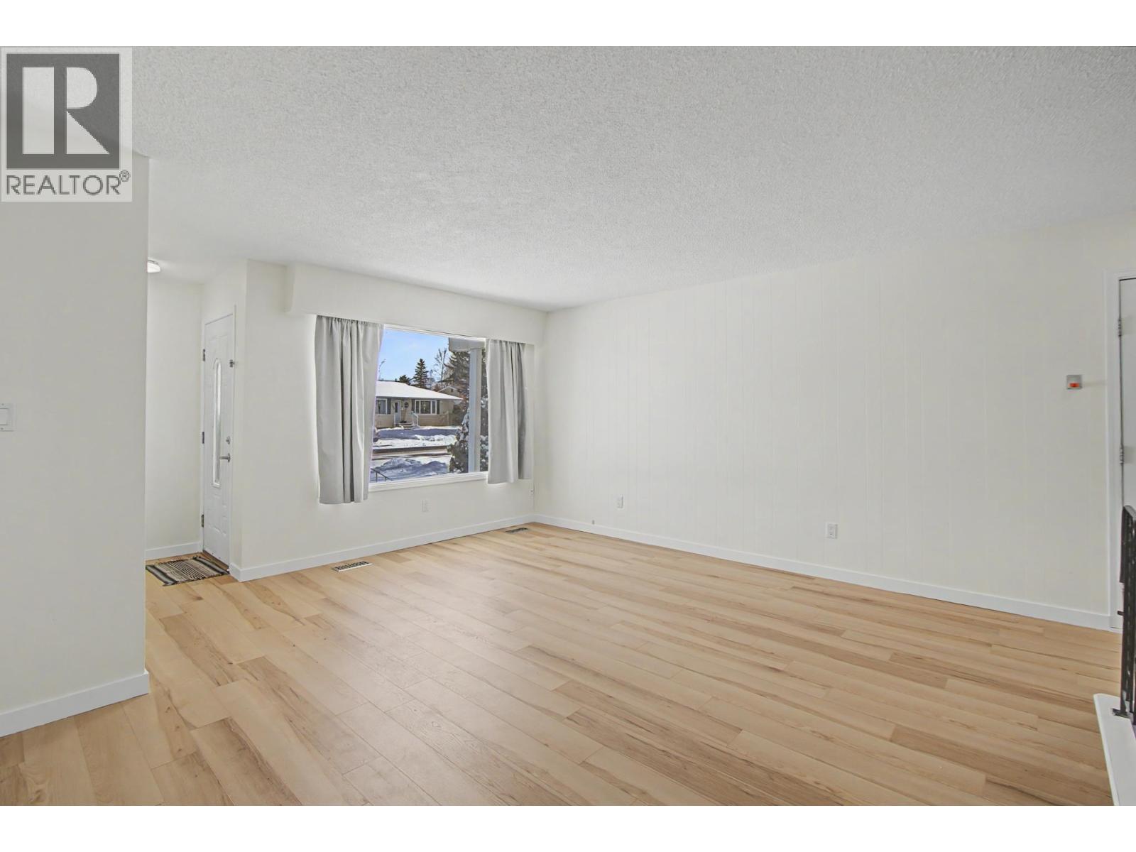 Primary bedroom of 5977 SIMON FRASER AVENUE · Prince George, BC