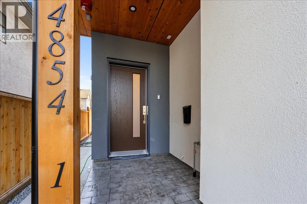 4854 SLOCAN STREET — photo 2