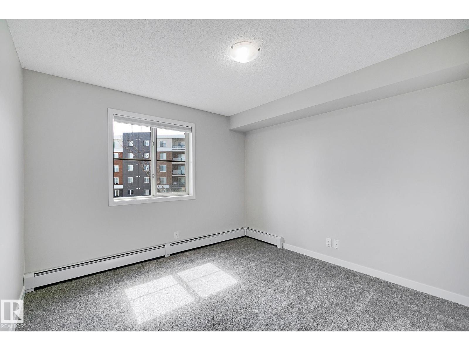 #306 12035 22 AV SW - 23