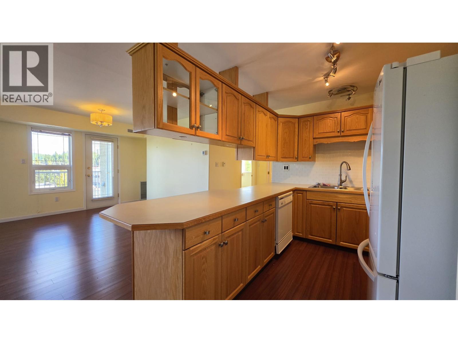 Primary bedroom of 301 1693 6TH AVENUE · Prince George, BC