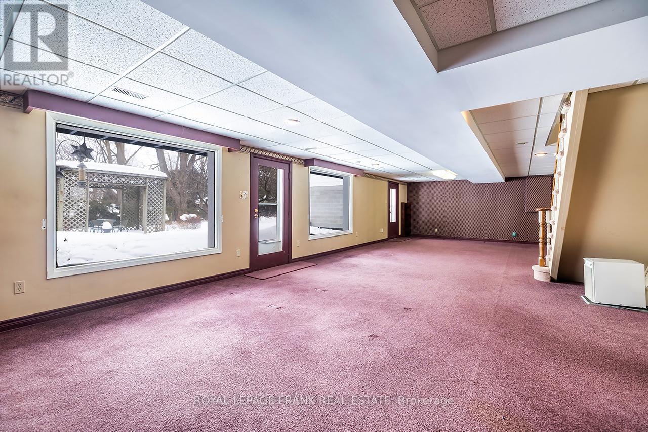 Large Picture Windows & W/O to Patio & Garden