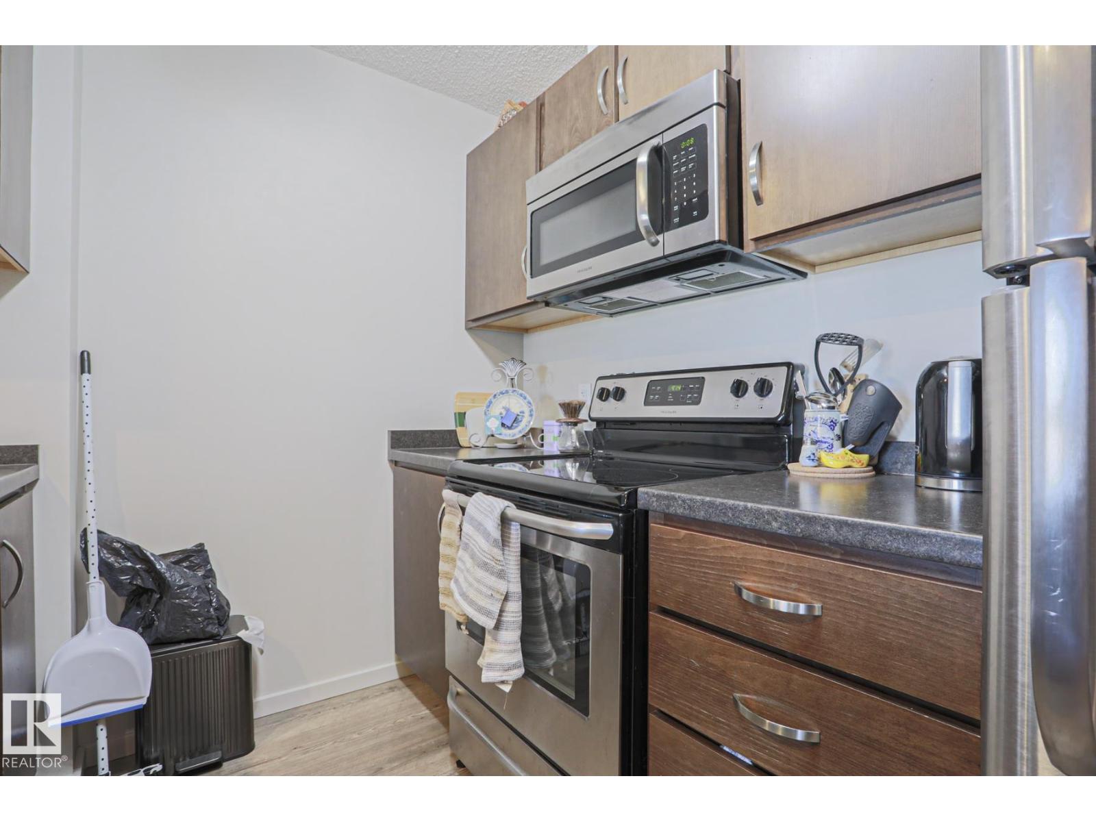 #303 7711 71 ST NW NW - 13