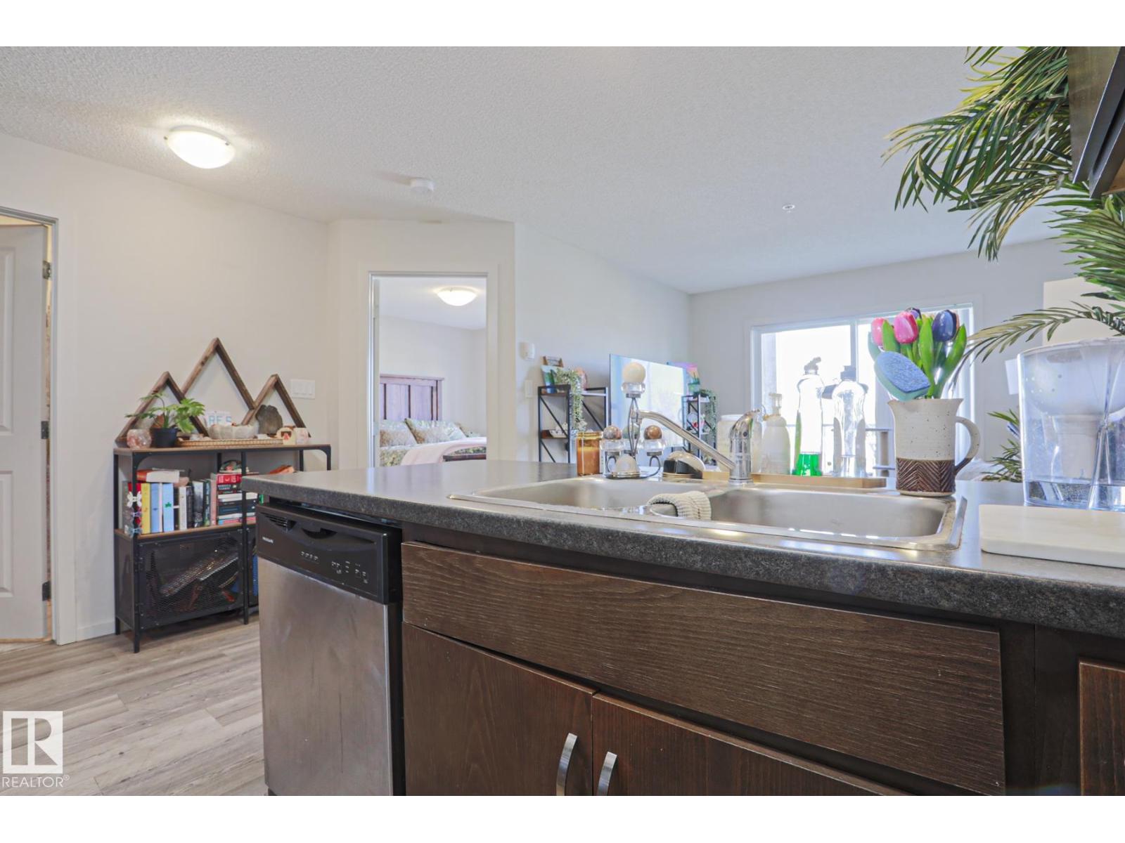#303 7711 71 ST NW NW - 14
