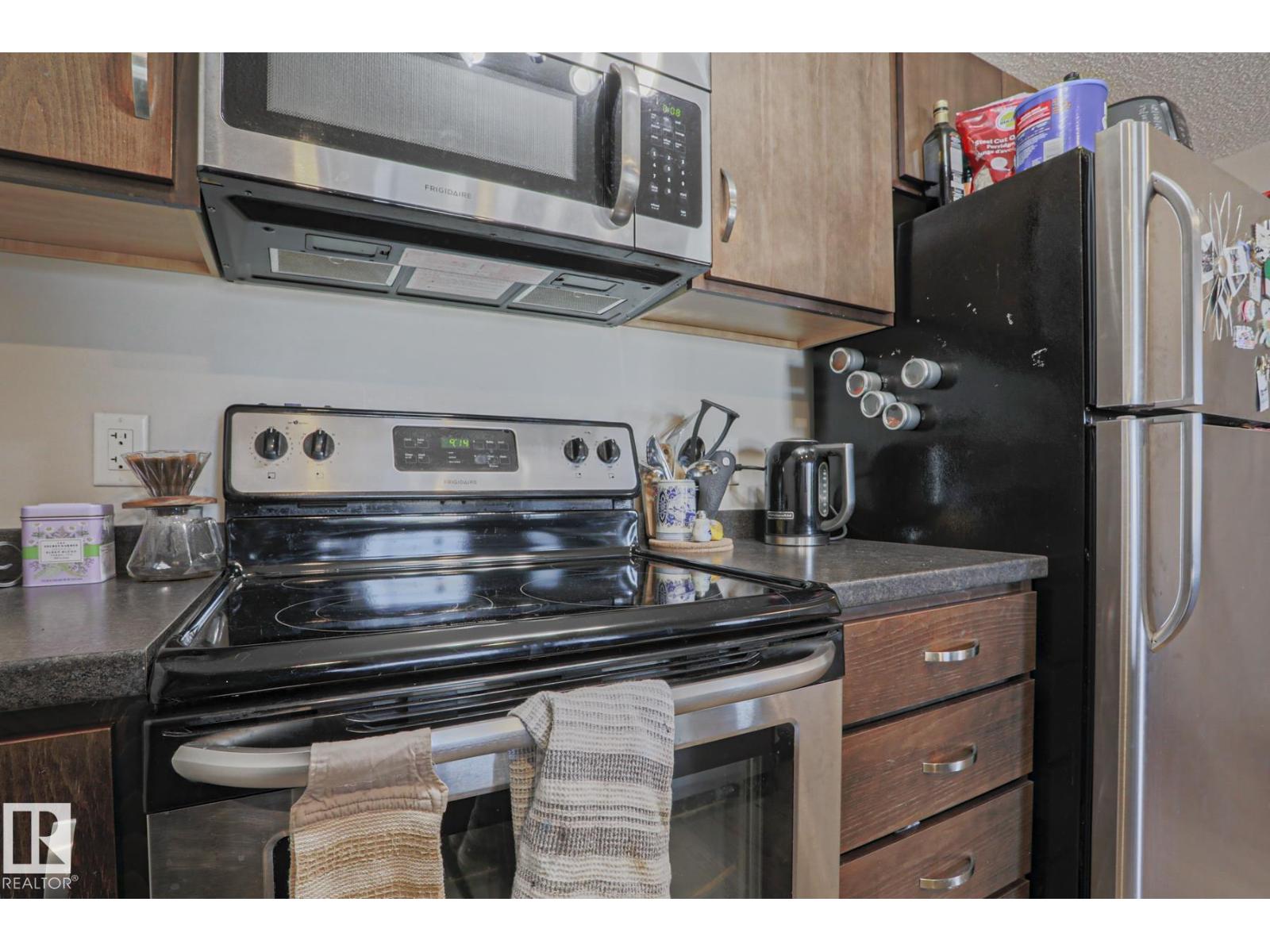 #303 7711 71 ST NW NW - 15