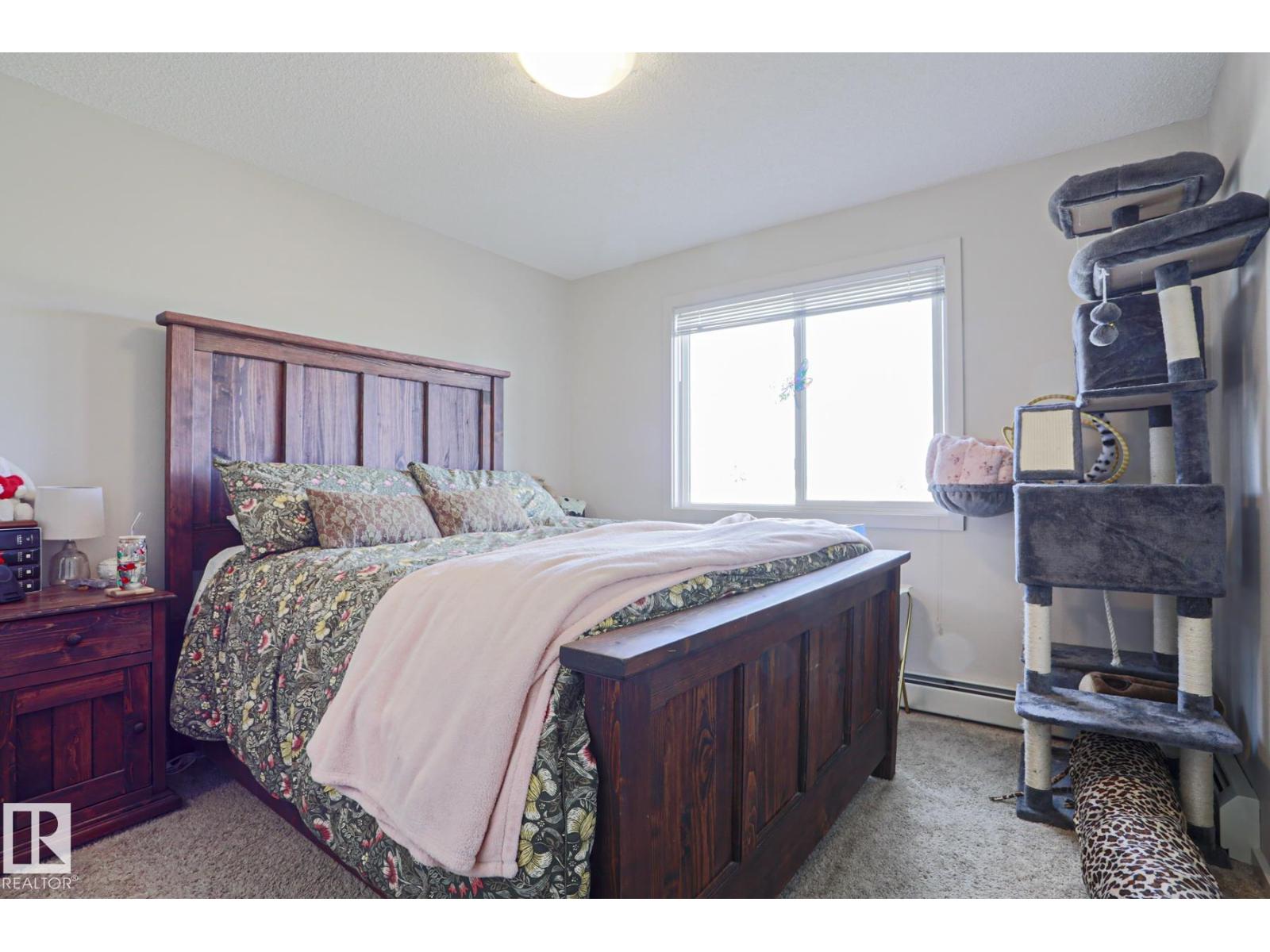 #303 7711 71 ST NW NW - 17