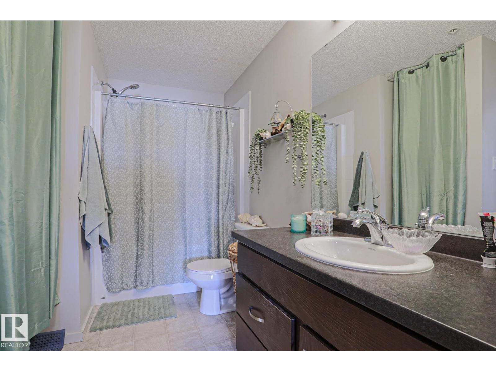 #303 7711 71 ST NW NW - 19