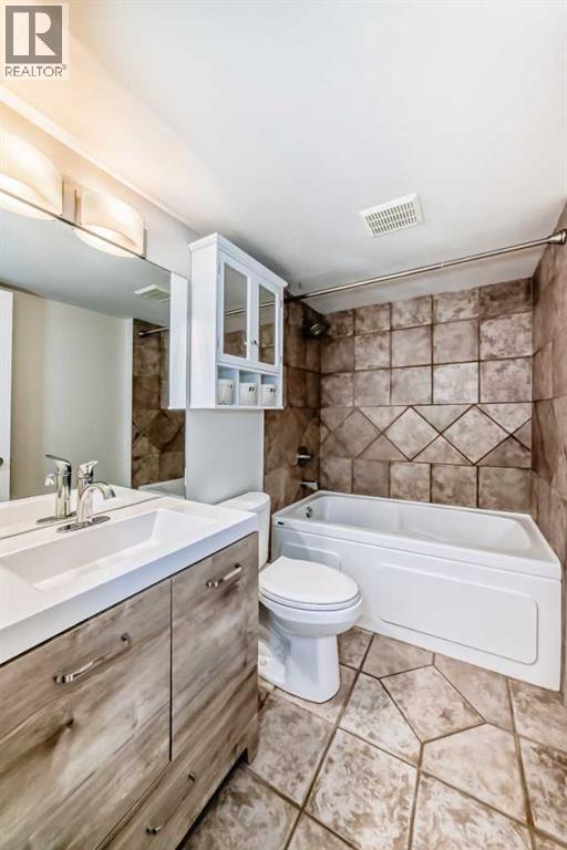#303 835 18 Avenue SW - 34