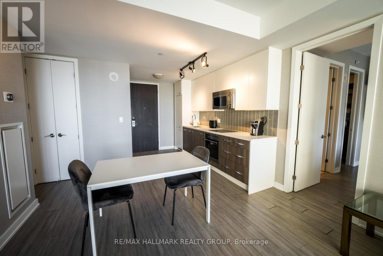 Kitchen w/Quartz Counters and European Appliances