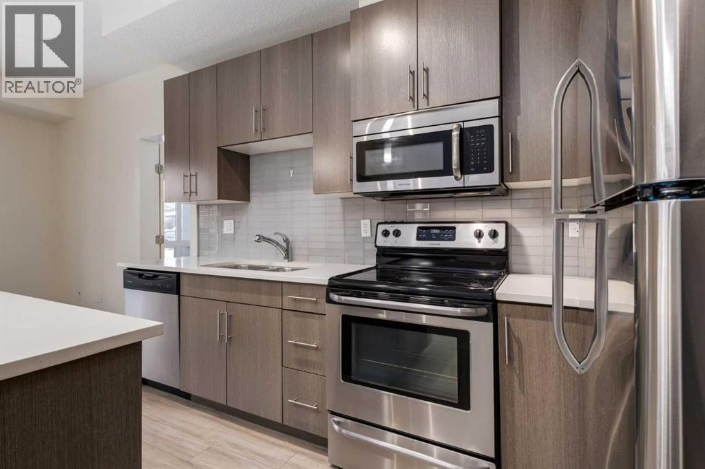 #102 15233 1 Street SE - 5