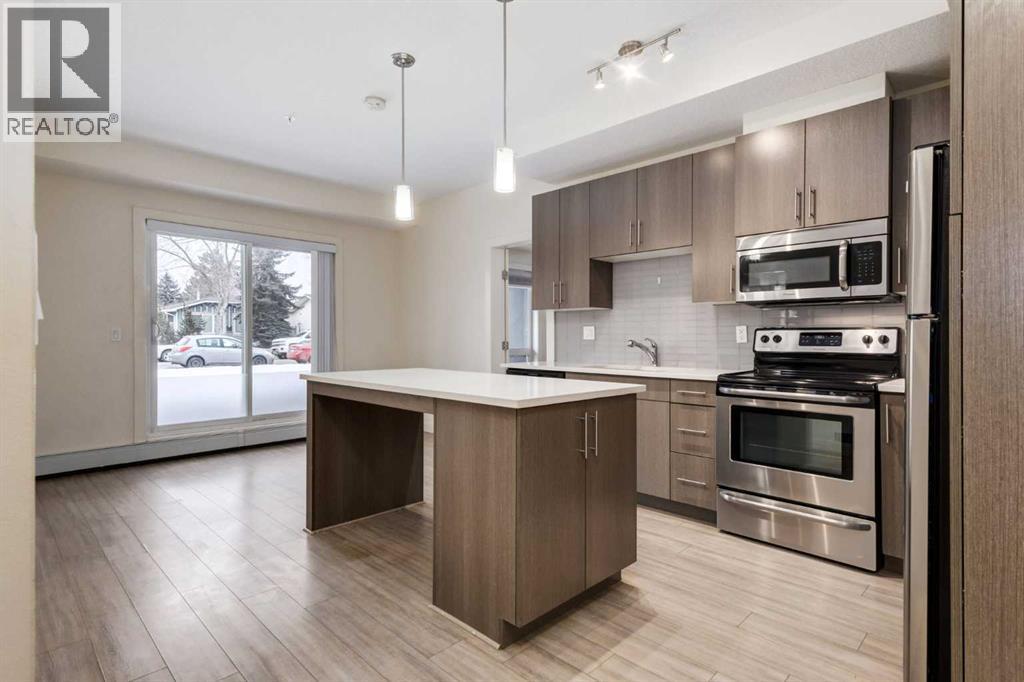 #102 15233 1 Street SE - 1