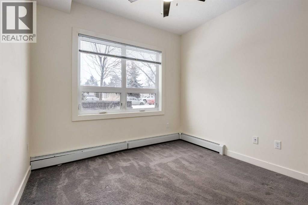 #102 15233 1 Street SE - 15