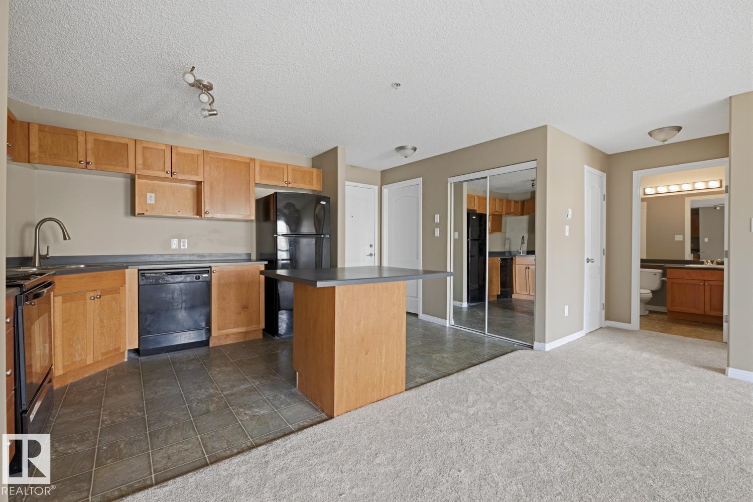 #5106 7335 SOUTH TERWILLEGAR DR NW - 5