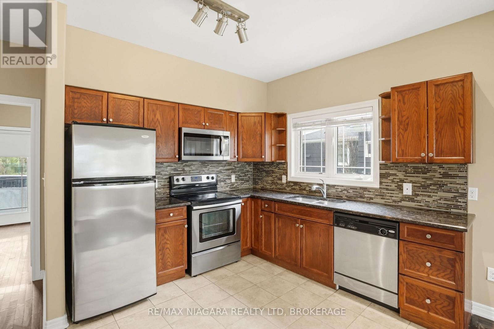 #106 6045 DUNN STREET - 13