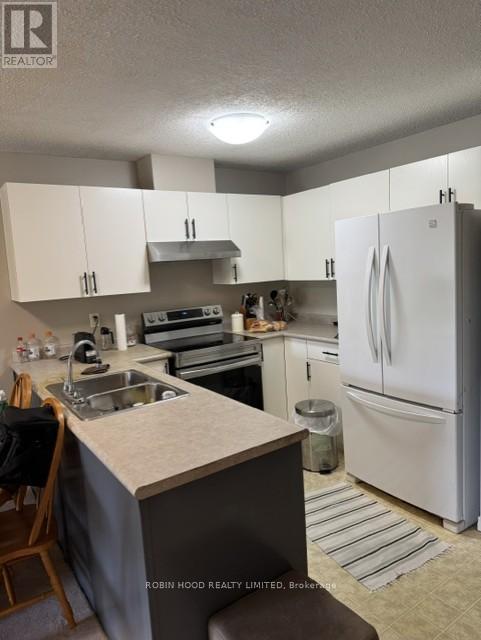 #203 3160 WILDWOOD DRIVE - 2
