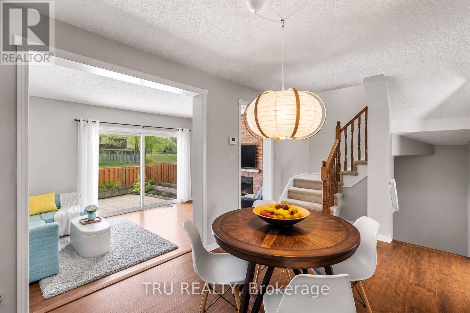 Spacious dining rm extends to warm open living rm