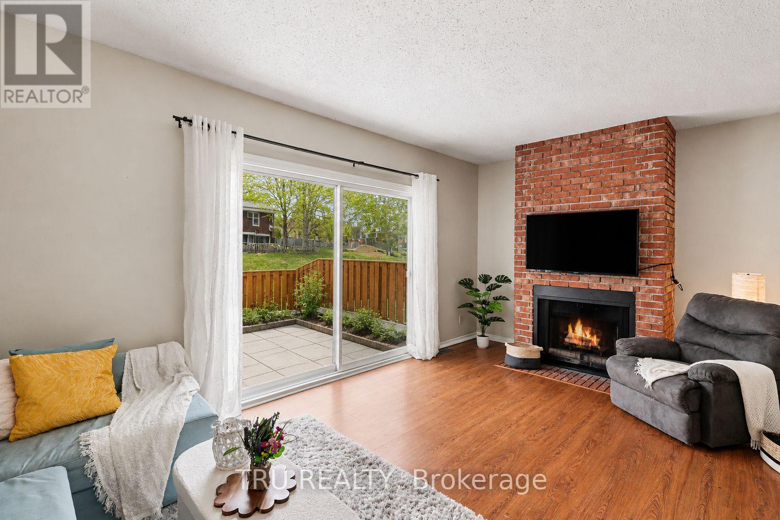 Warm inviting living room with wood fireplace