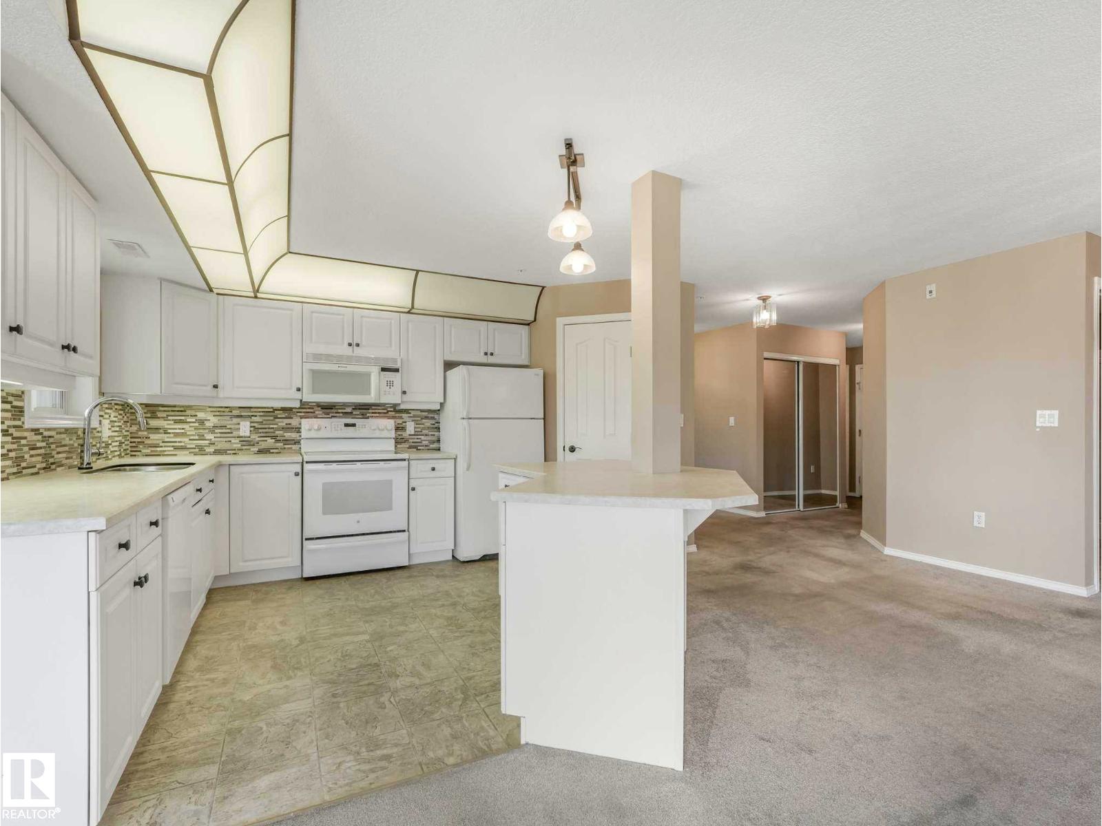 #302 6703 172 ST NW - 17