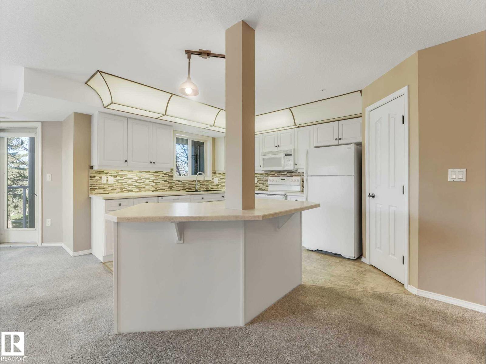 #302 6703 172 ST NW - 18