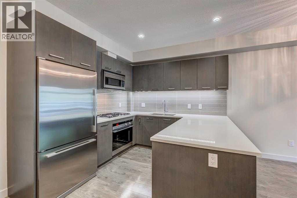 #102 323 20 Avenue SW - Image 2