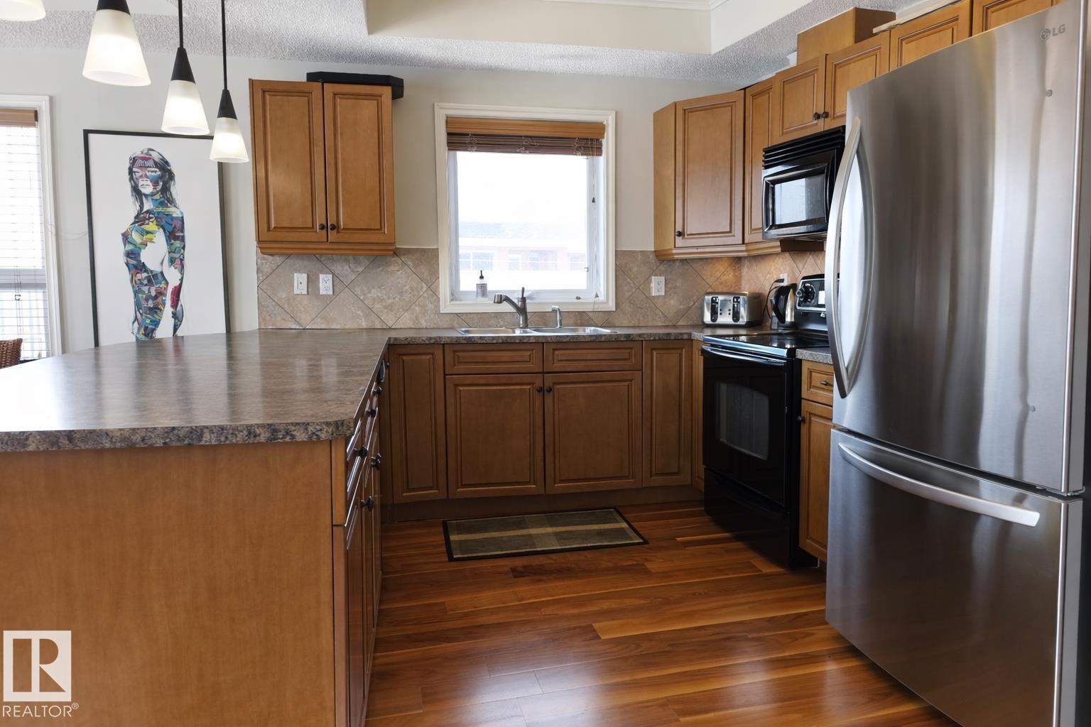 #406 10232 115 ST NW - 8