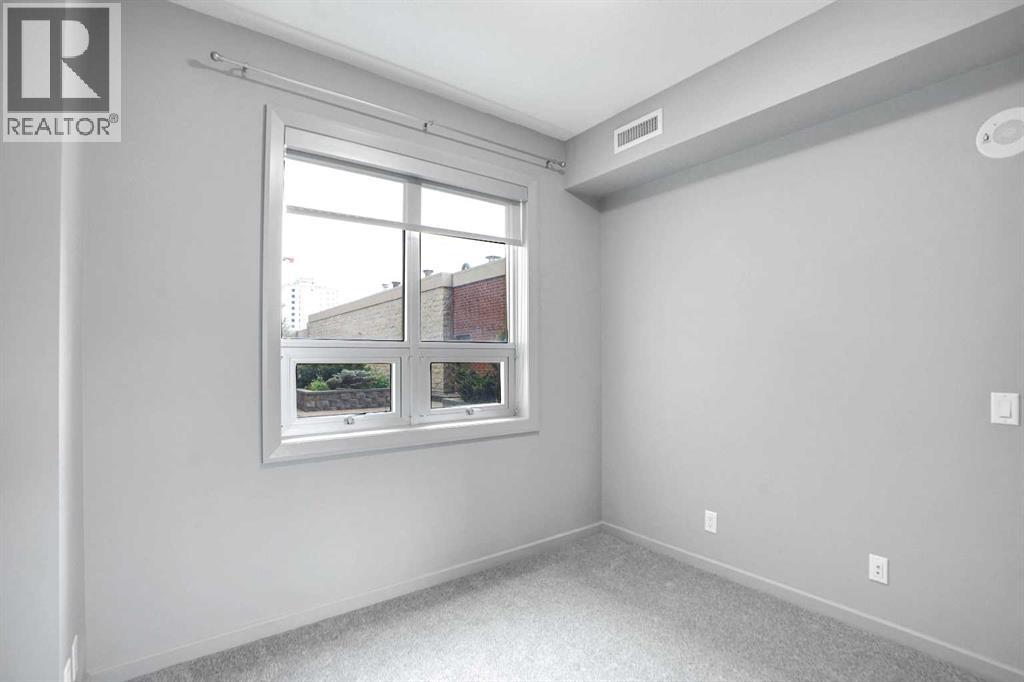 #210 1410 1 Street SE - 16