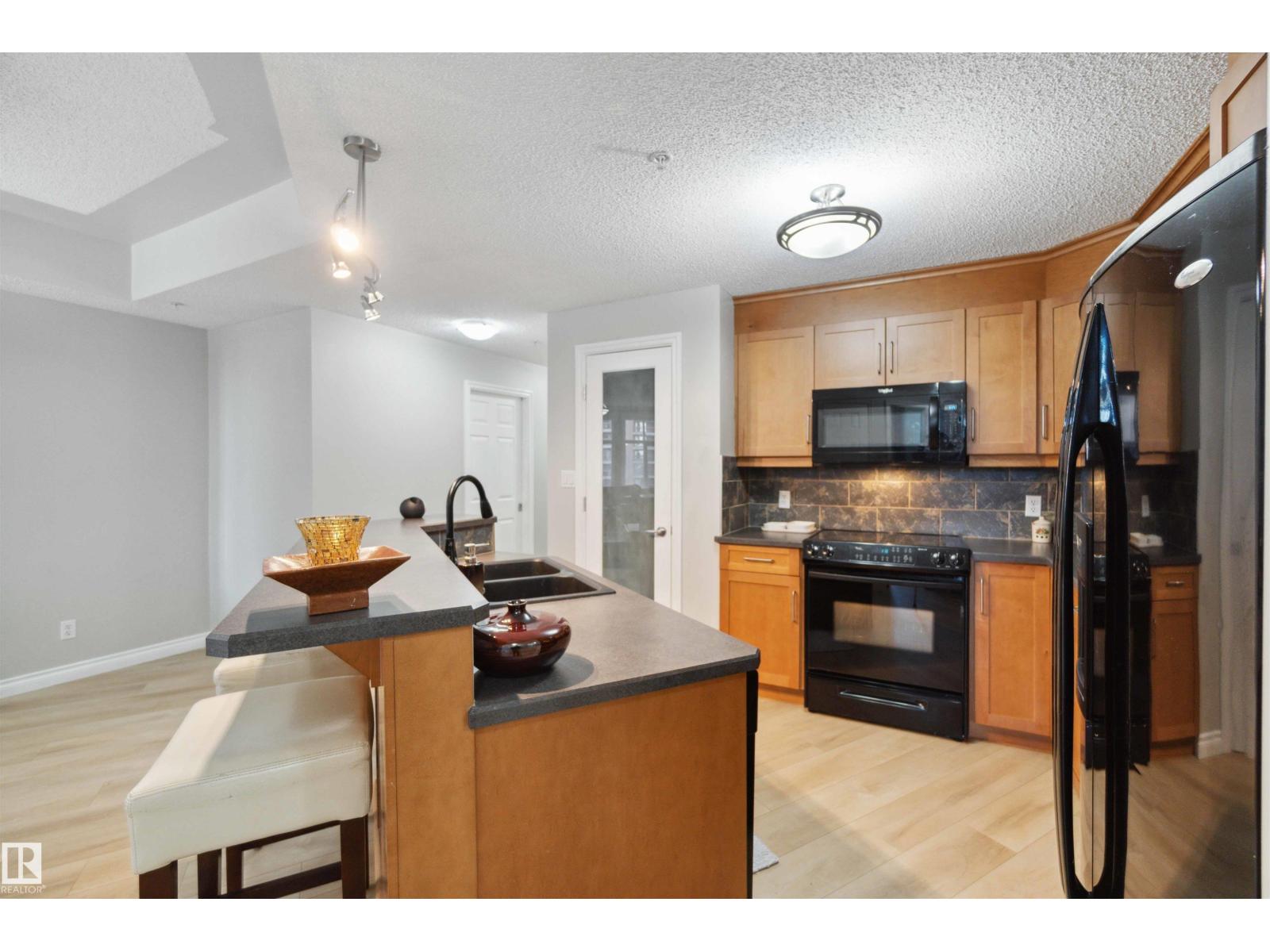 #402 9020 JASPER AV NW - 5