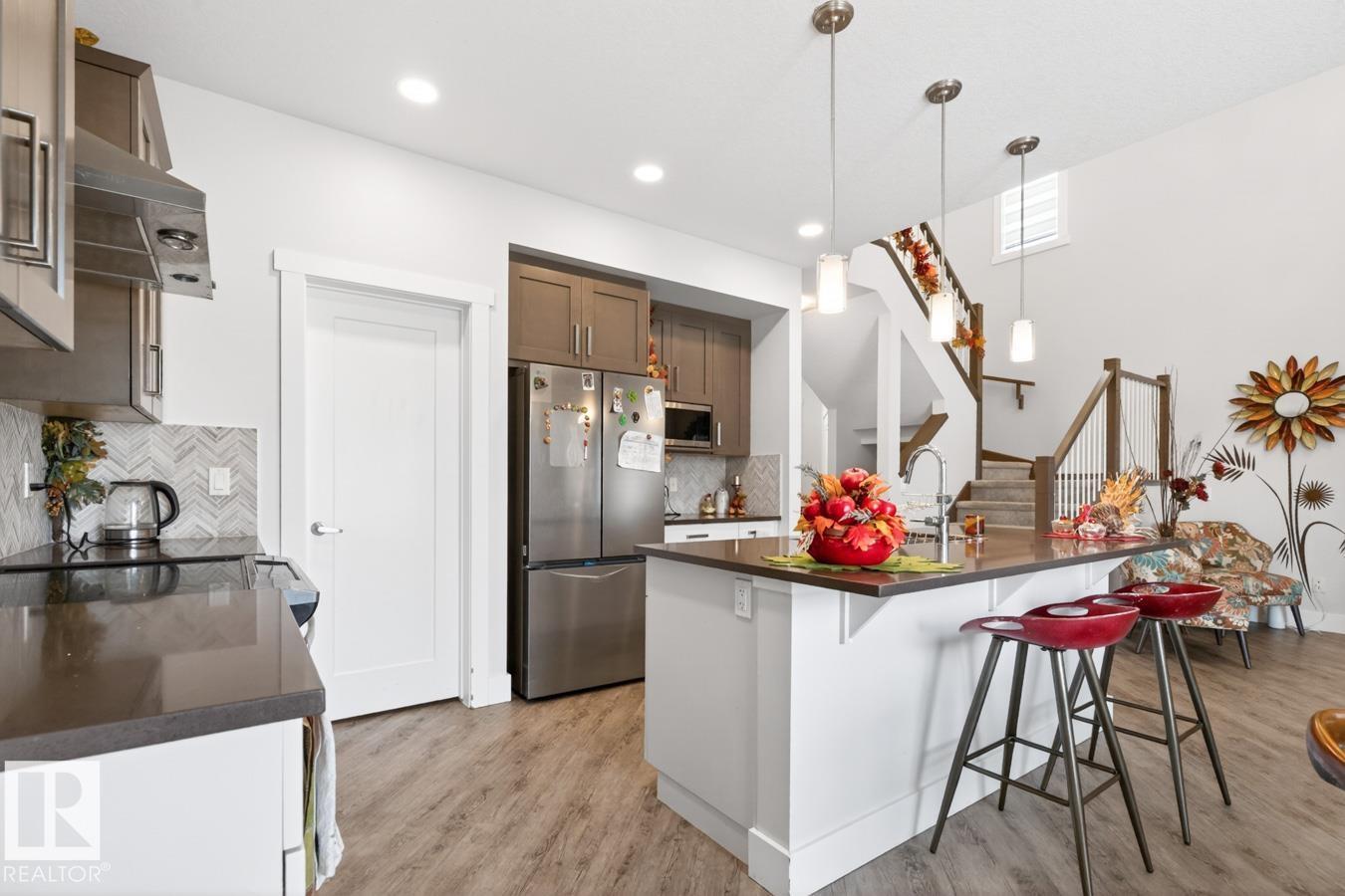 7942 ERASMUS CR NW - 11