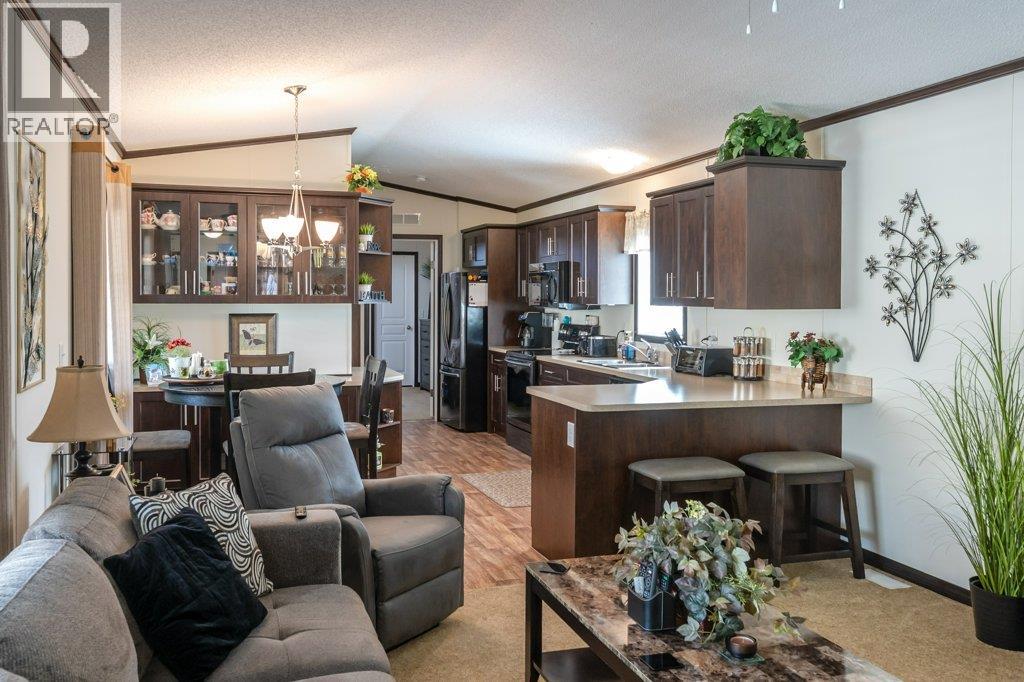 6633 PARK Drive Unit# 36, Oliver