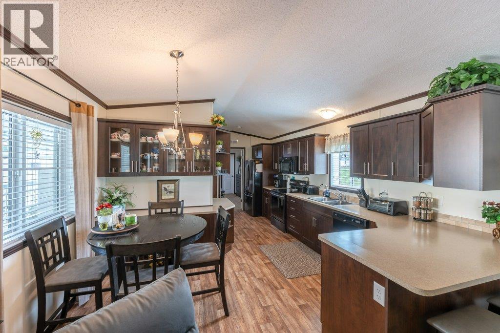 6633 PARK Drive Unit# 36, Oliver