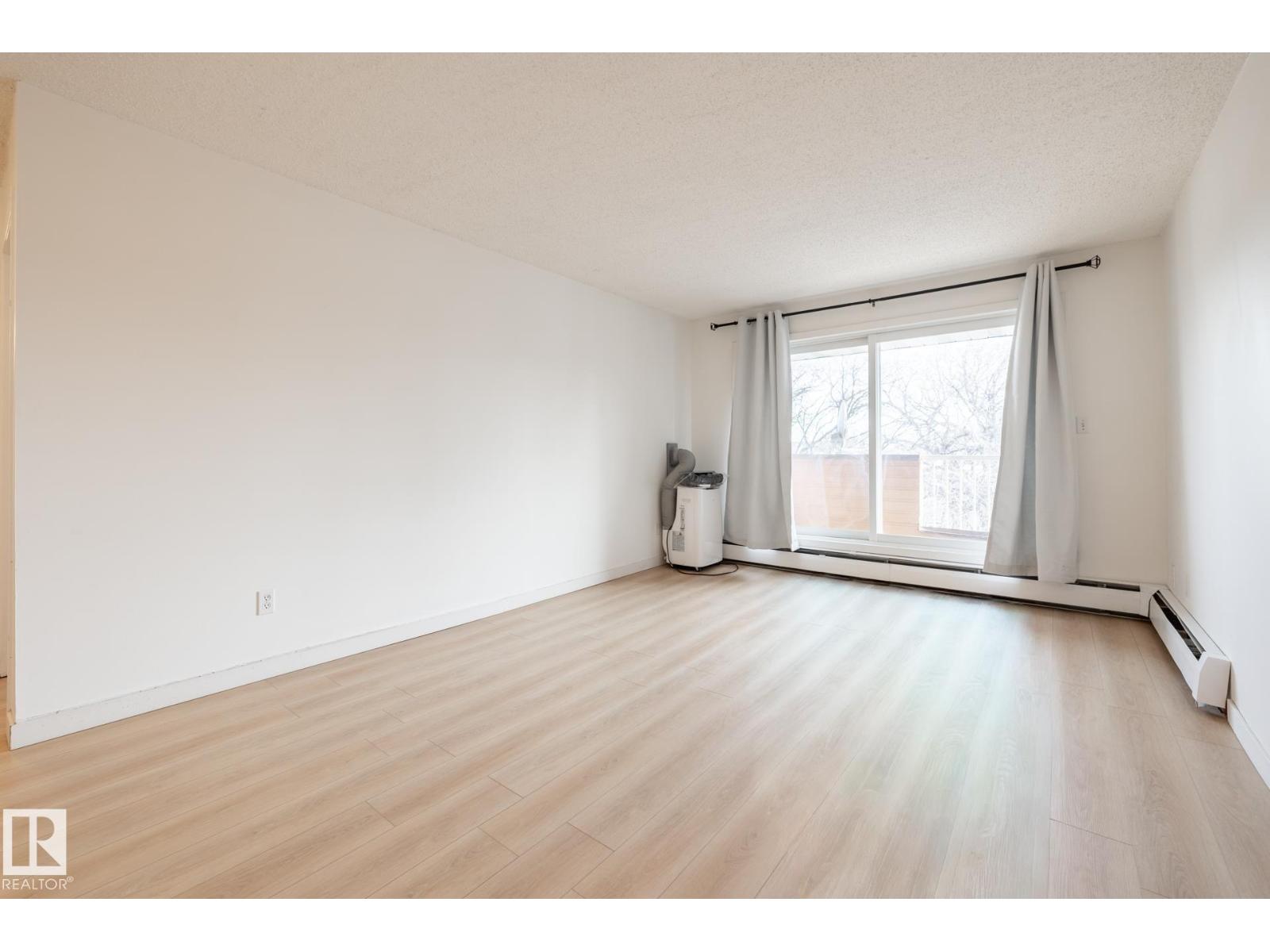 #303 10620 104 ST NW - 8