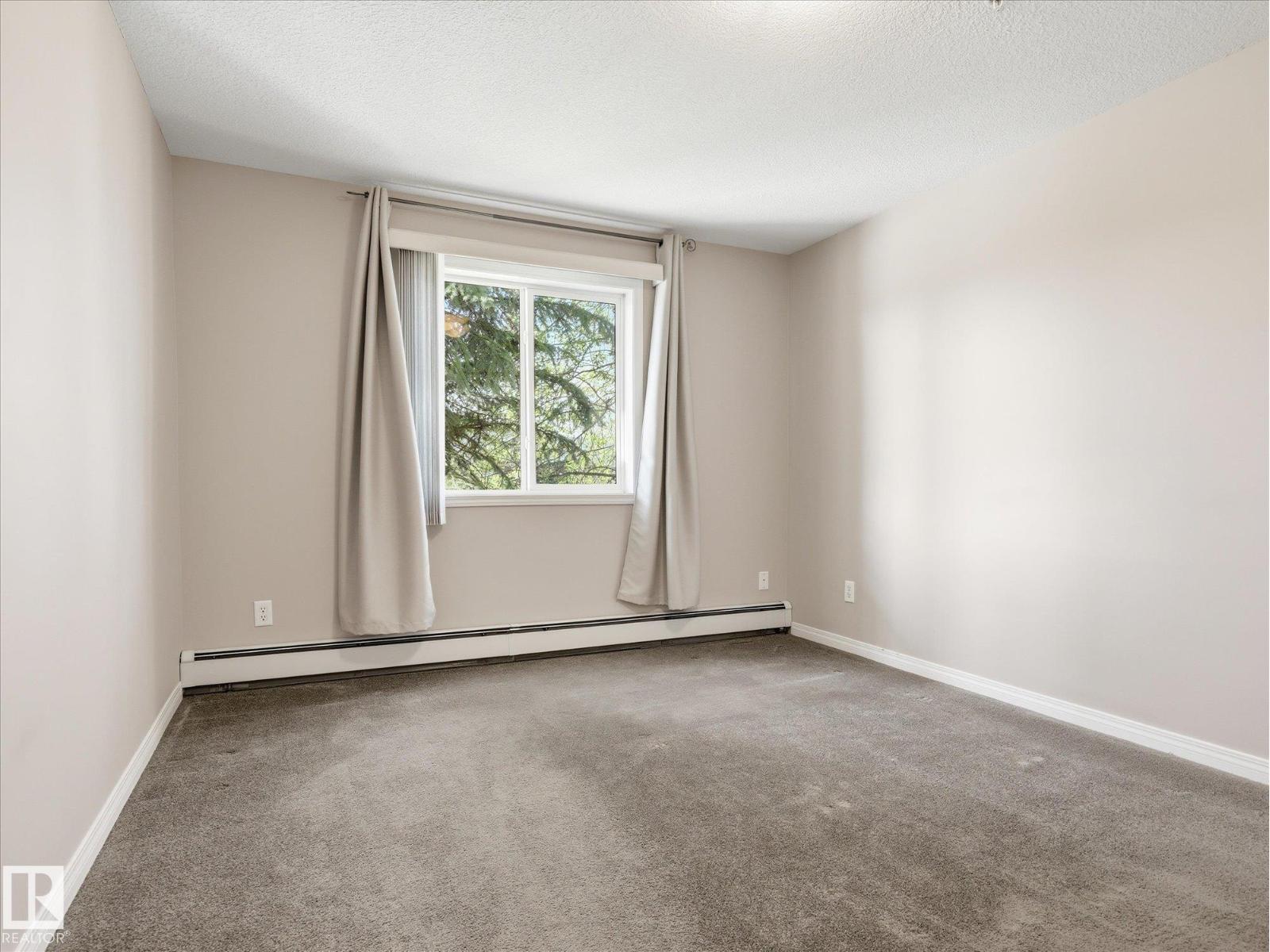 #217 12550 140 AV NW - 12