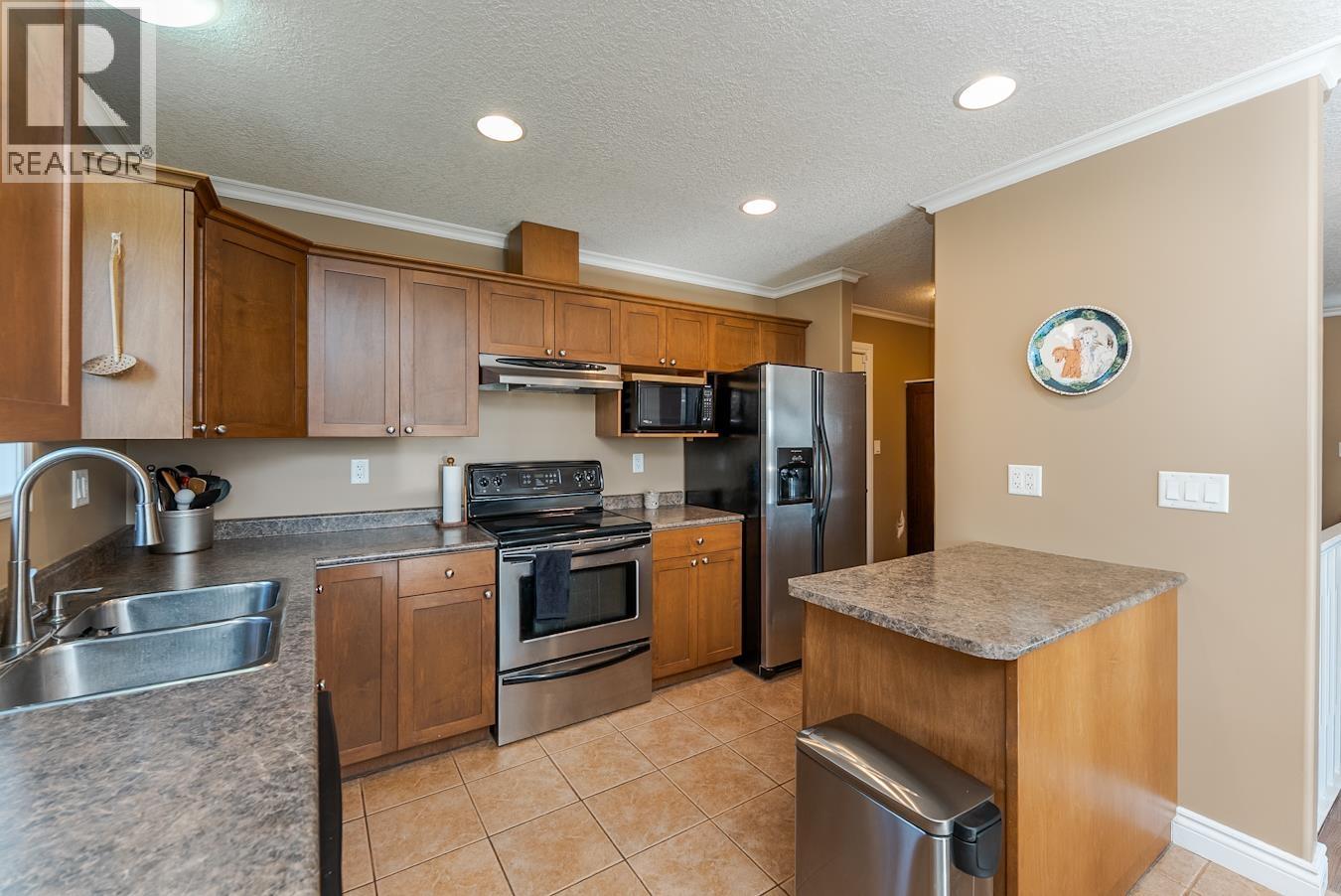 Primary bedroom of 8385 MURALT ROAD · Prince George, BC