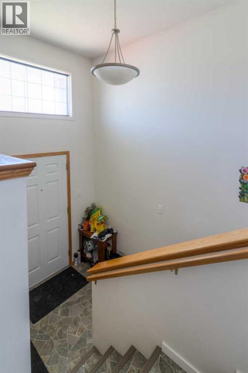 287 peigan Court W
