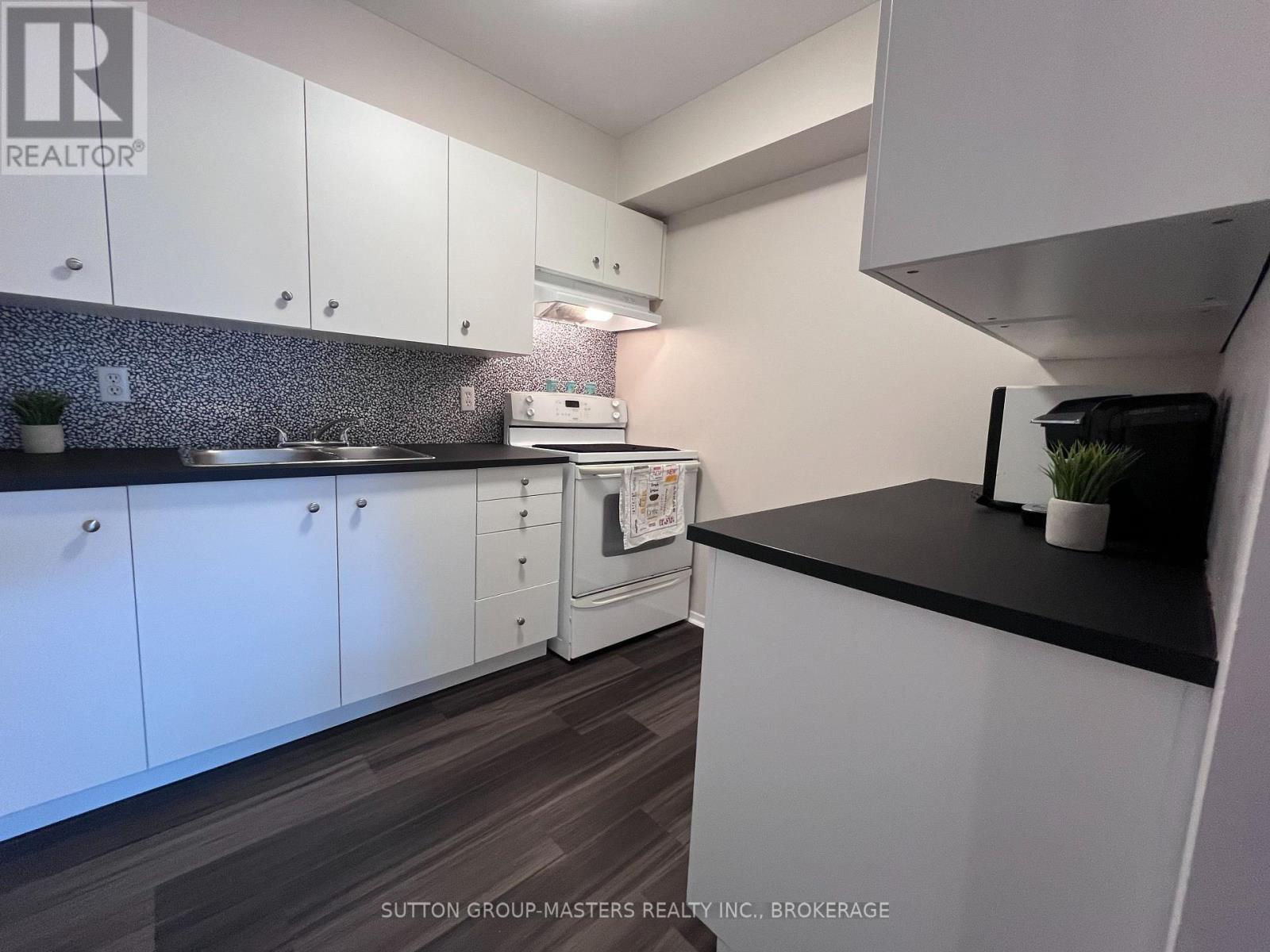#208 310 KINGSDALE AVENUE - 19