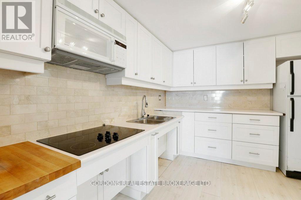 #103 3099 CARLING AVENUE - 14