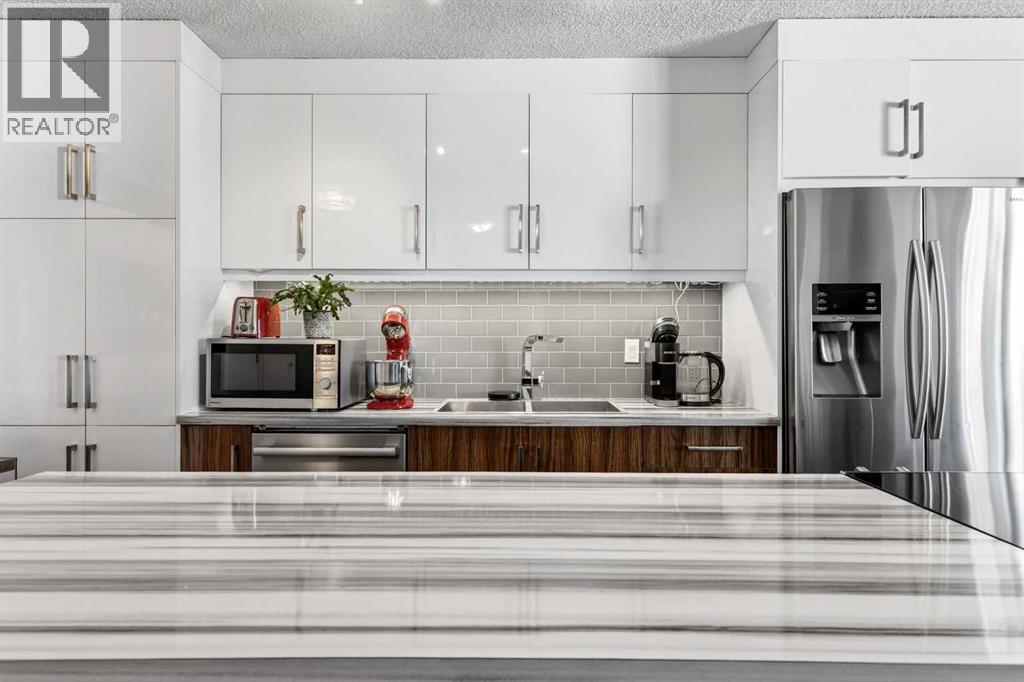 #802 1213 13 Avenue SW - 13