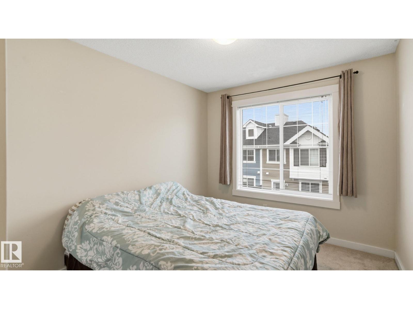 #202 8530 94 ST NE - 26