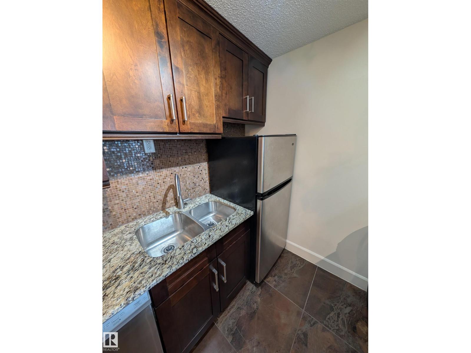 #705 12141 JASPER AV NW - 10