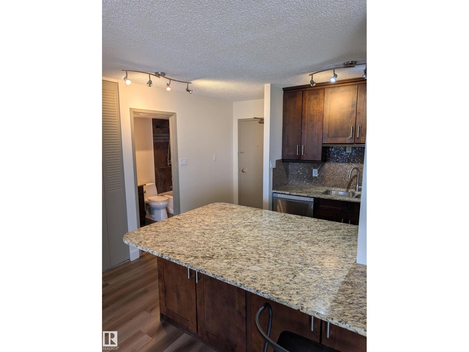#705 12141 JASPER AV NW - 11