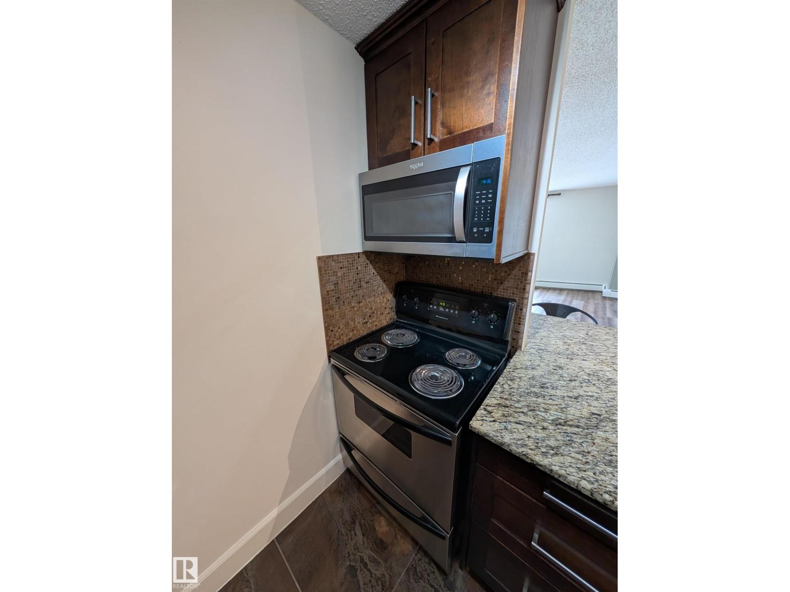 #705 12141 JASPER AV NW - 9