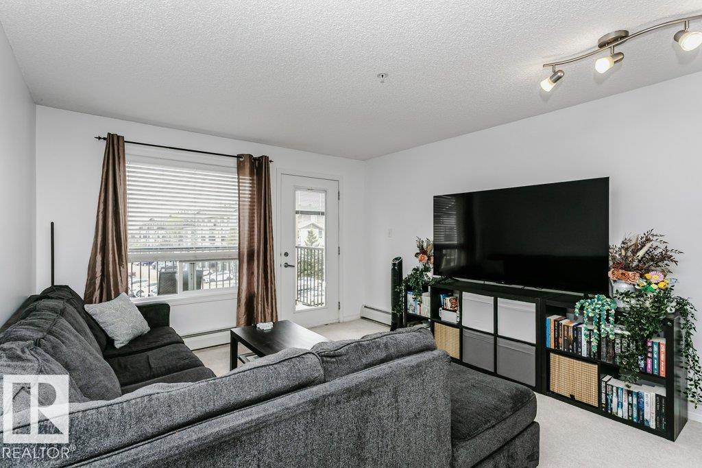 #6305 7331 SOUTH TERWILLEGAR DR NW - 10