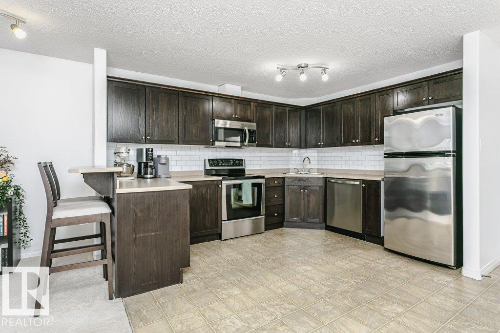 #6305 7331 SOUTH TERWILLEGAR DR NW - 4