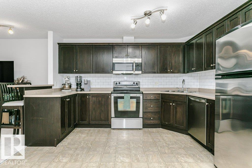 #6305 7331 SOUTH TERWILLEGAR DR NW - 6